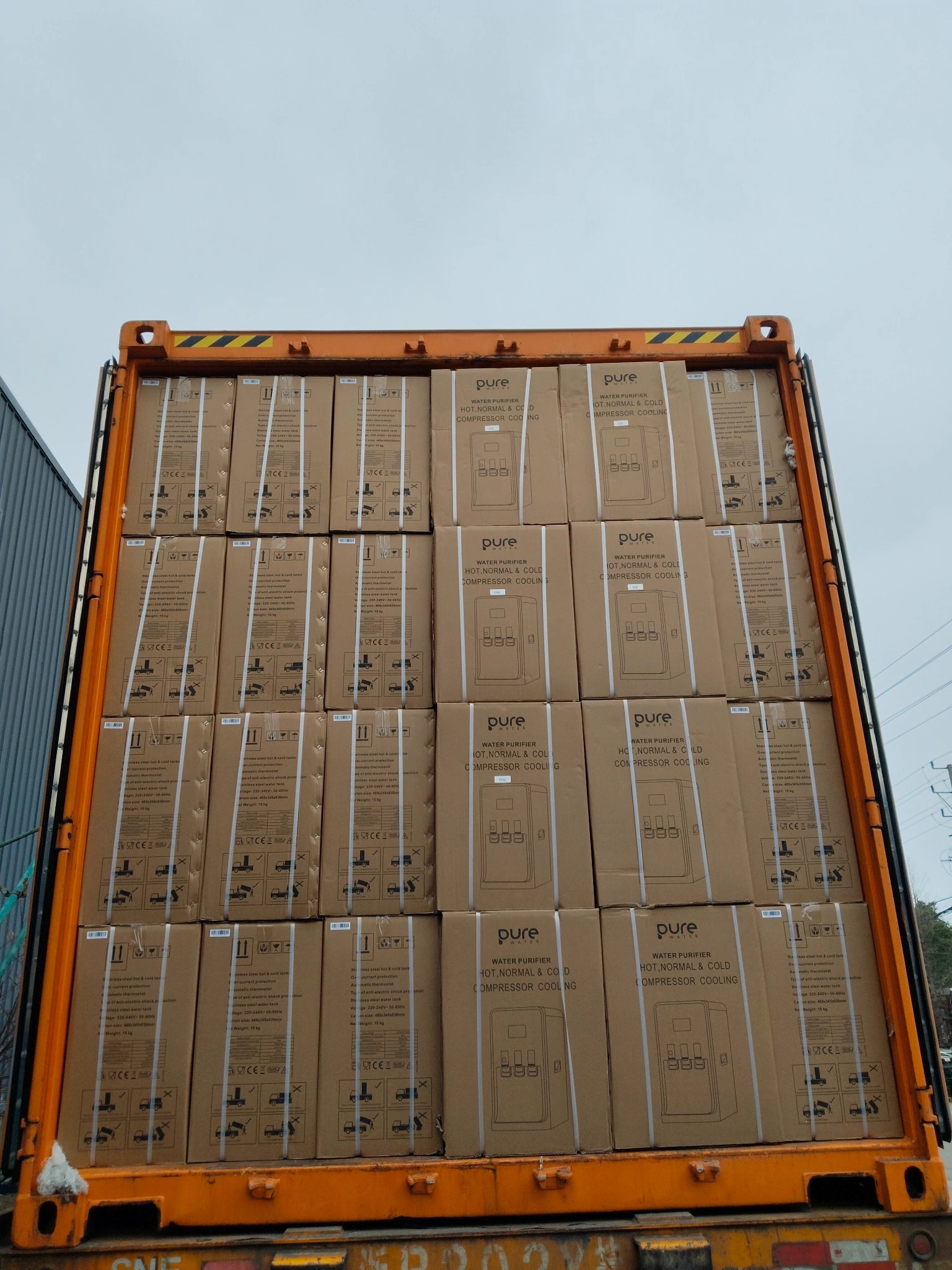 Full container shipment of Pure Water branded water dispensers