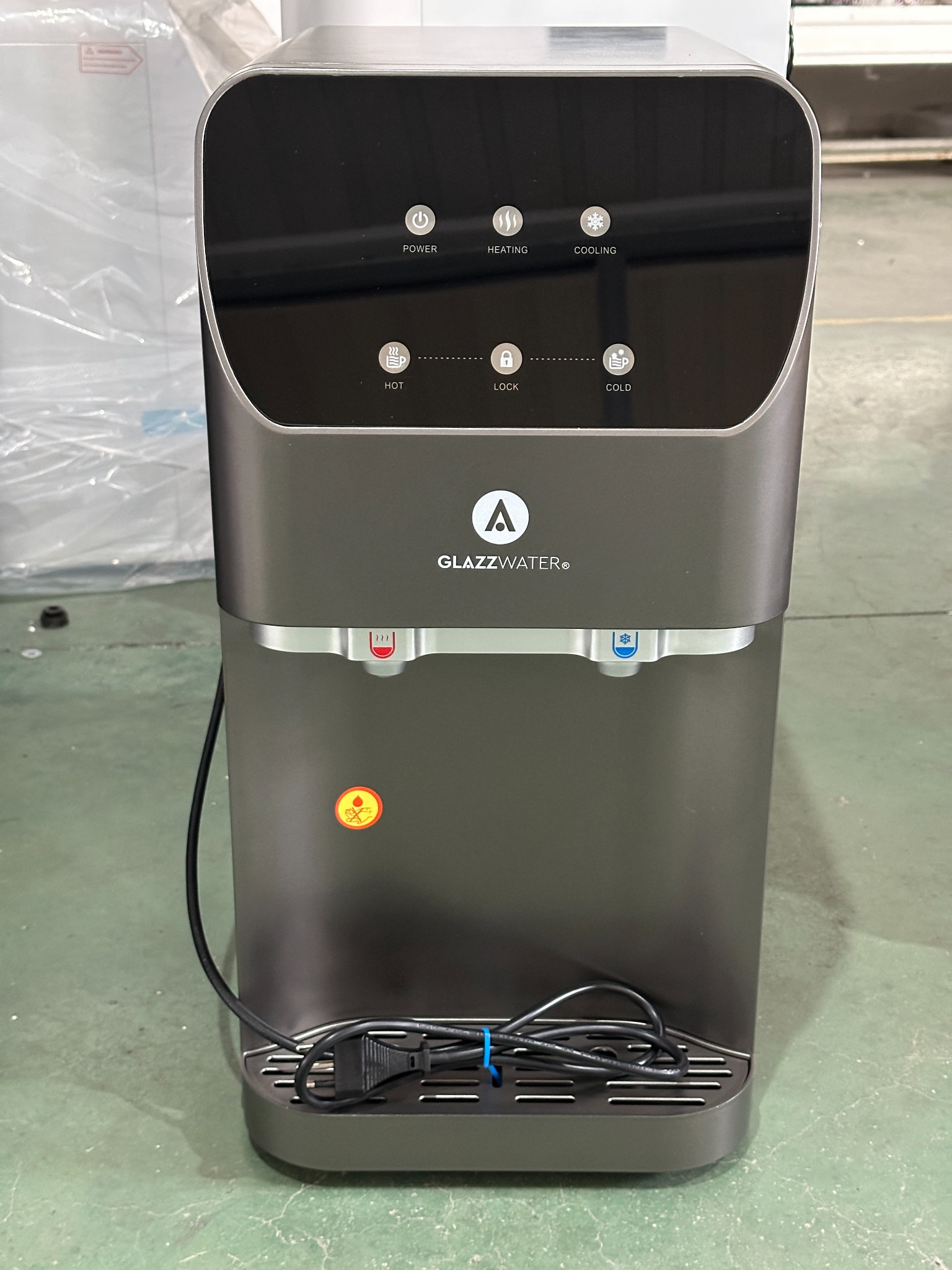 Dark gray countertop dispenser with private-label logo